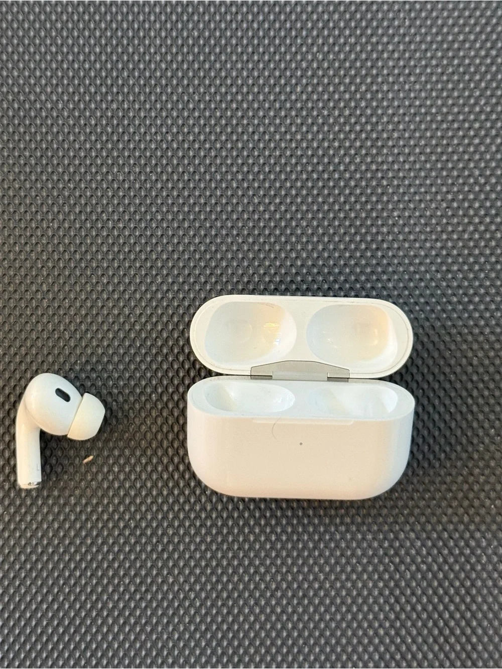 Apple 2nd generation AirPods (left earbud only) + Case + clear blue Case Cover